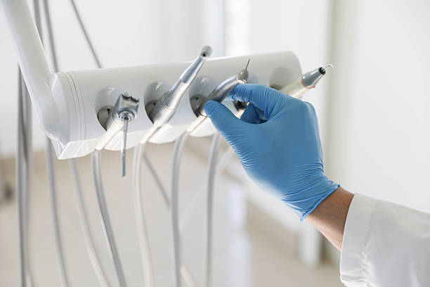 Professional Emergency Dentist technician working in Manitowoc, WI